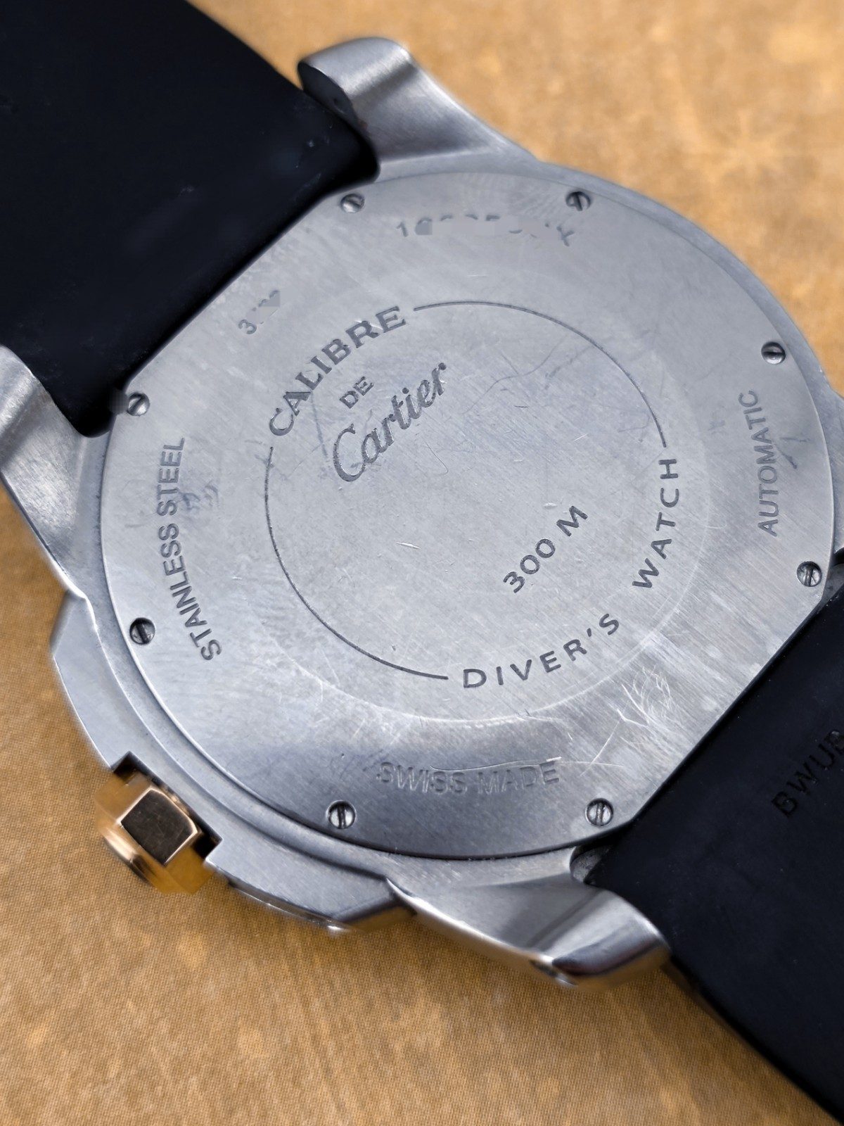 Cartier Calibre de Cartier Gold SS Auto 42mm Black Dial Rubber W7100055 Fullset
